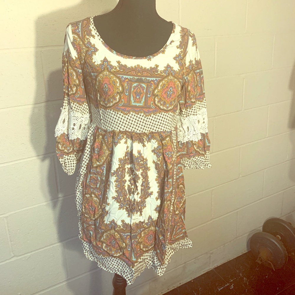 Brown and cream patterned blouse